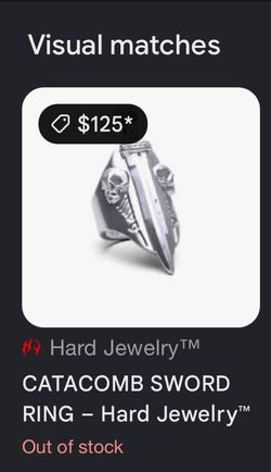 This is the Hard Jewelry Catacomb Sword Ring, featuring a striking 3D medieval sword set against an organic, distressed skull and bone motif.