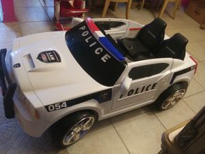Photo Police car working very well charger battery lg car two seater