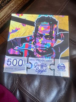 Spin Master Graffiti Egypt puzzle featuring vibrant multicolor artwork. Includes bold gold, blue, pink, purple, black and white tones. Ideal for décor