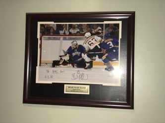 Autographed Brad Marchand first career goal plaque