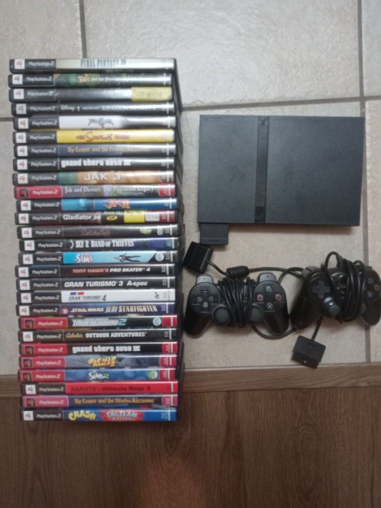 Playstation 2 With Games And 2 Controllers