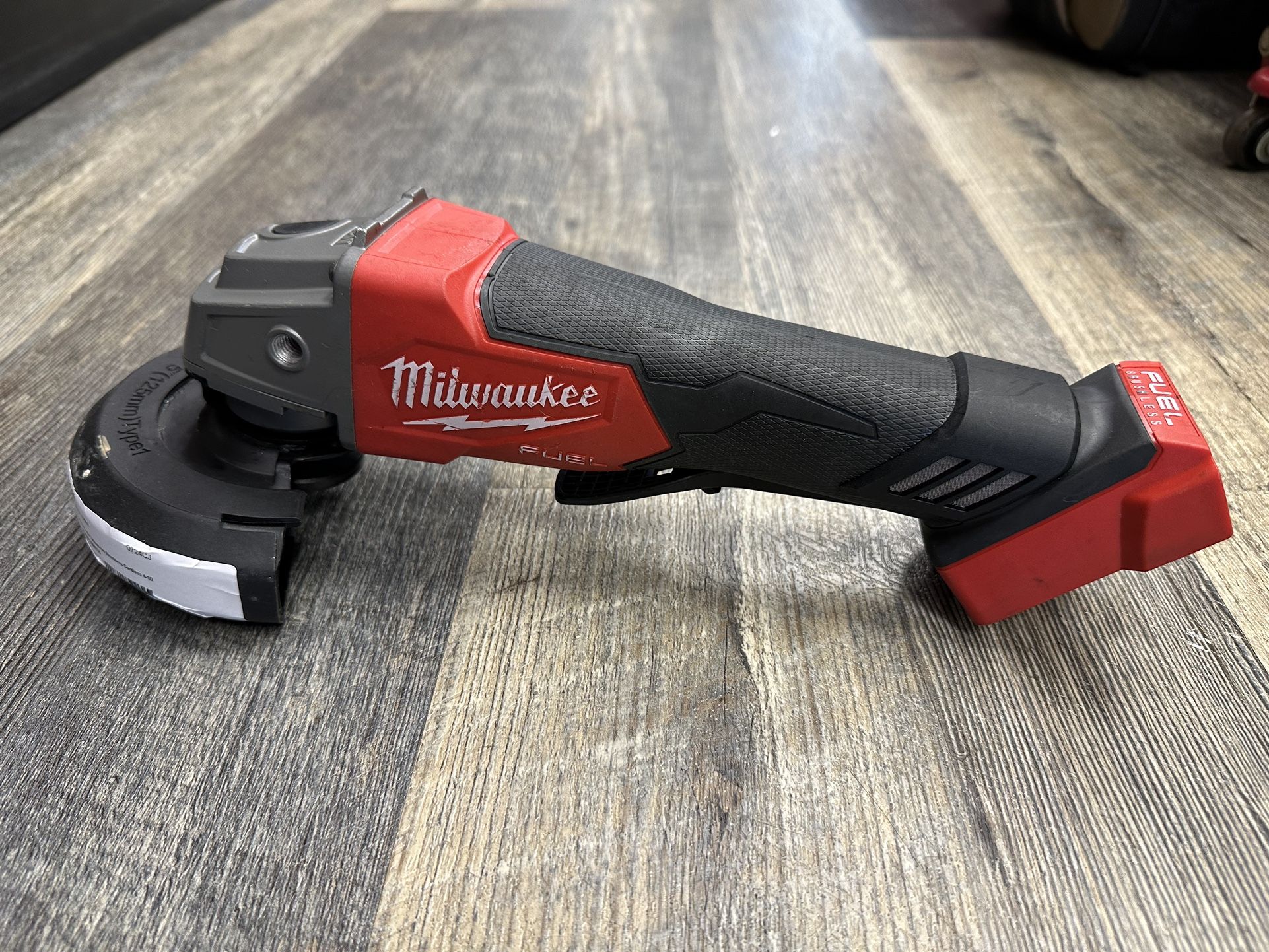 Milwaukee 2880-20 M18 FUEL Brushless Lithium-Ion 4-1/2". / 5 ". Cordless Small Angle Grinder