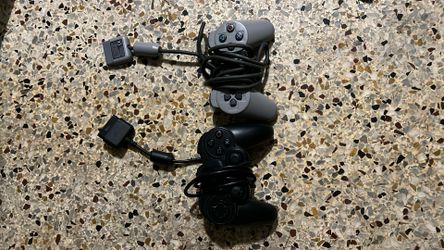 PlayStation 2. 2 Controllers For 19