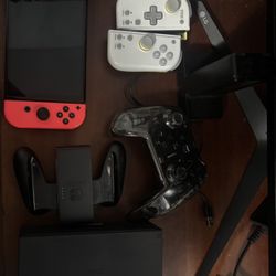 Nintendo Switch oled Console w/ Joy-Con, Carrying Case, Street Fighter, Smash Bros