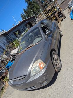 Parting out 2003 Kia Rio parts
