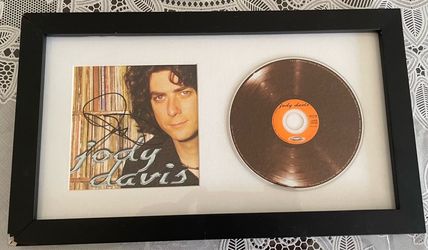 Disc and signed booklet with musician