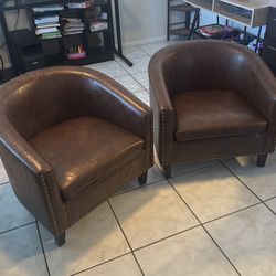 2 Faux leather accent chairs