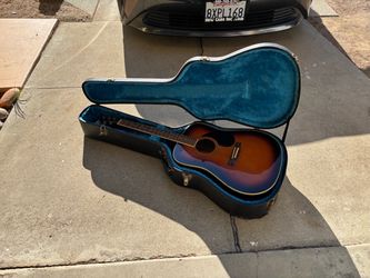 Broken Guitar and Case