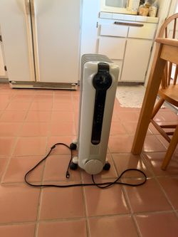 Oil heater delonghi 1500w