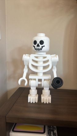 16 skeleton Lego figure with accessory