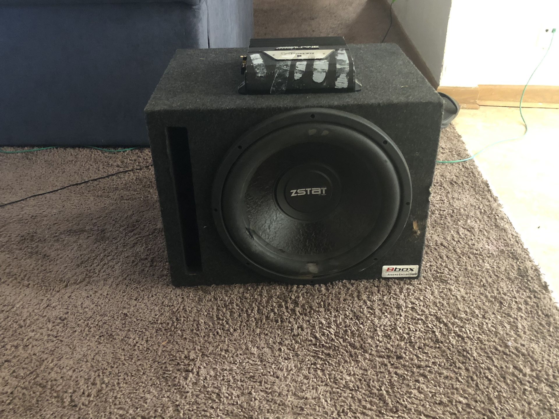 One 15 Zstat subwoofer and special series Alpine amp