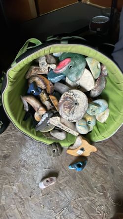 collection of older rock climbing gym holds