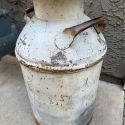 Antique milk can