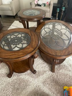 Ashley brown oak coffee table an end tables