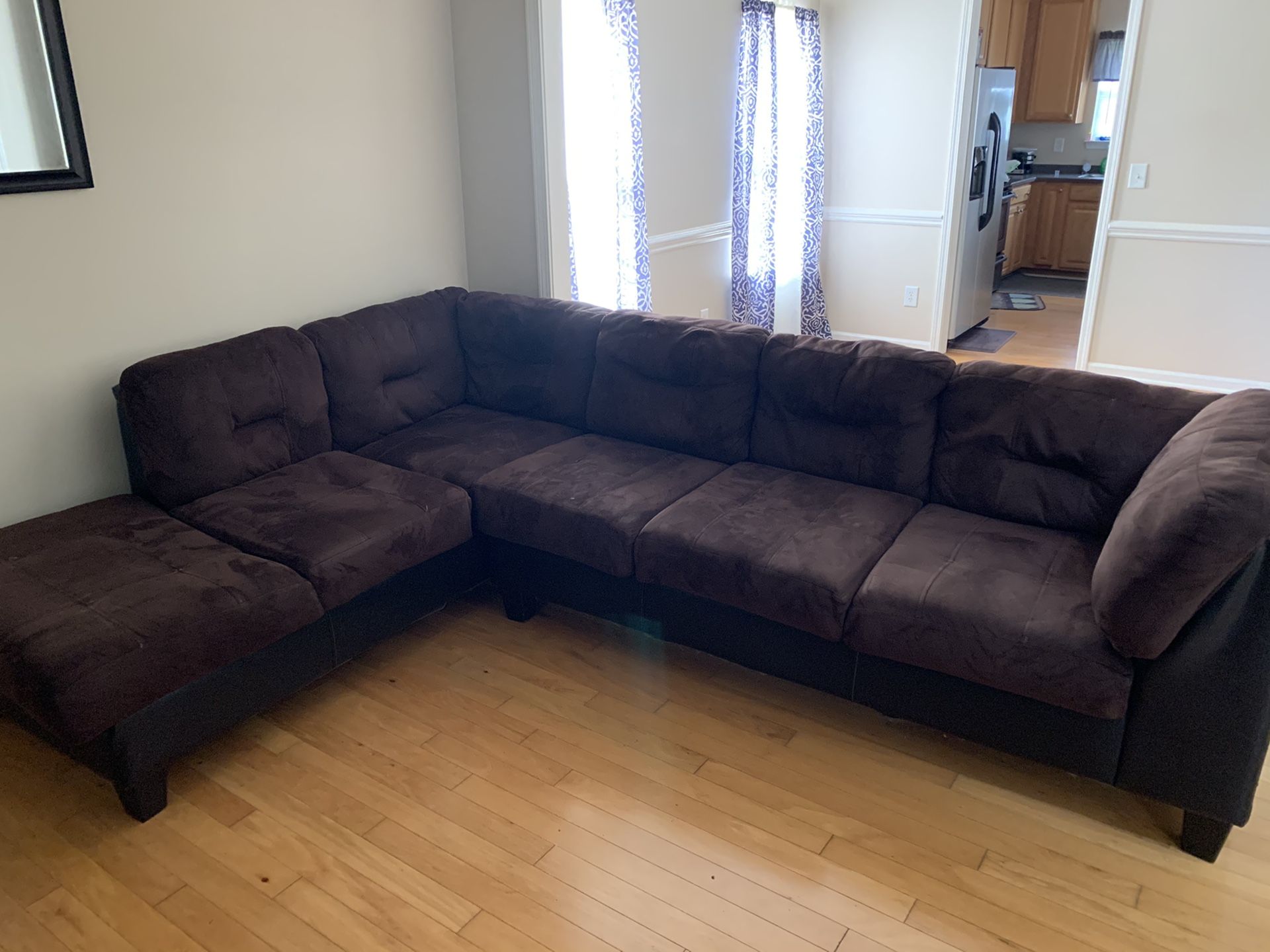 Brown and black sectional couch