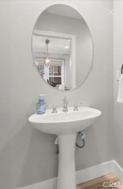Oval pedestal sink - fixtures included