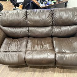 Refurbished and Patched Bonded Leather Pullout Couch