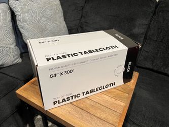 54” x 300 feet of black plastic tablecloth