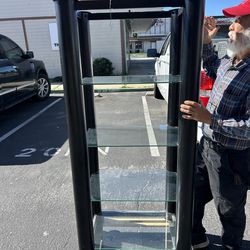 Bell'O AR 711 audio tower, featuring a black steel frame and tempered glass shelves designed for organizing audio/video components