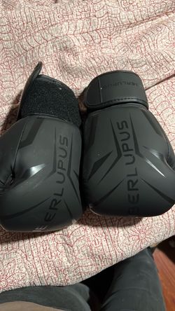 Two sets of men’s boxing gloves