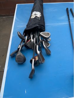 Golf club set and bag.  20 + clubs and drivers