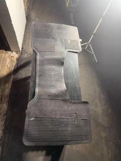OEM Ford F250 F350 Super Duty Center Hump Vinyl Floor Mat - Black (99-07)