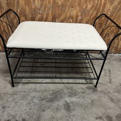 Corner metal sit down shoe bench/rack great shape pick up below.  31705 SR-54  Wesley Chapel, FL  33545 Metro Self Storage 