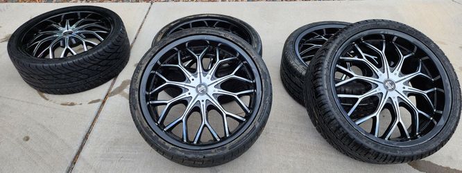 Five 20 inch Rims & Tires