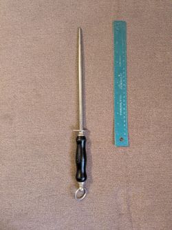Antique honing rod black handle