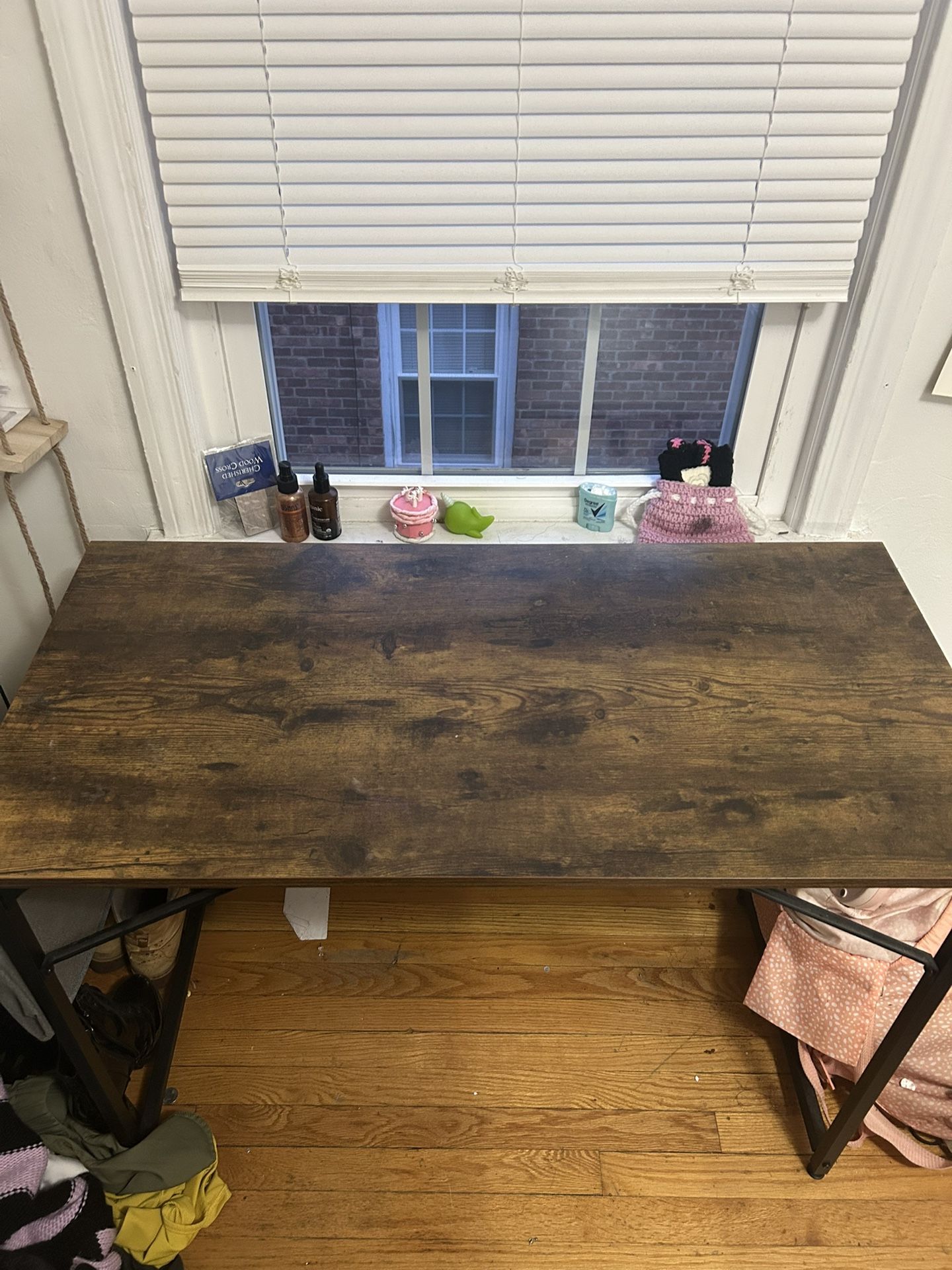 Wooden desk with holder on side