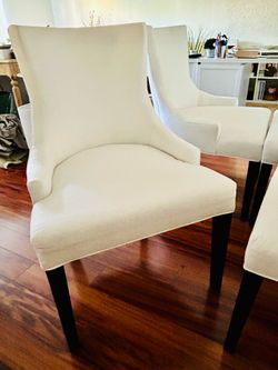 4 white dining chairs