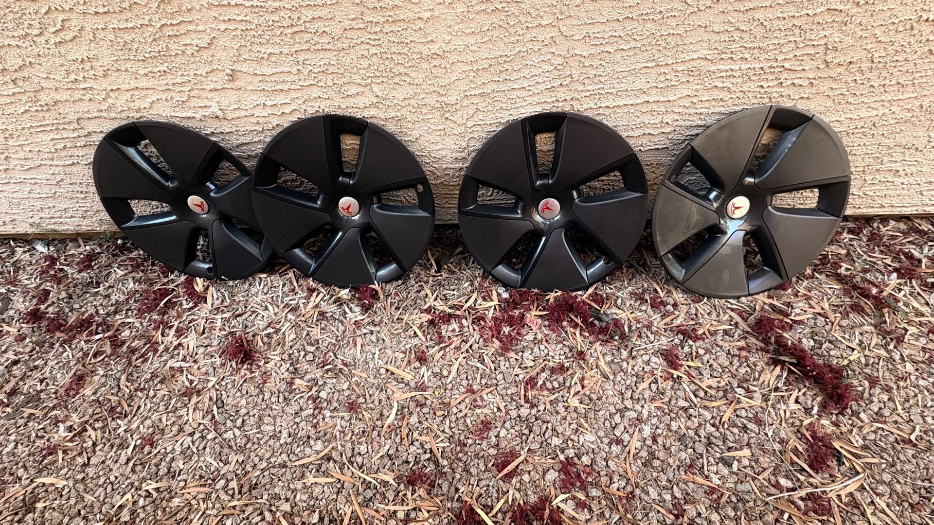 LIKE NEW TESLA MODEL 3 hubcaps with Red Centerpieces looks good miscellaneous to match the trim!!