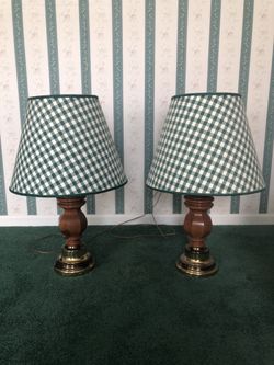 Set of two wooden table lamps with green and white shades 
