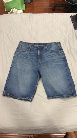 Levi’s dark blue 569 jorts waist 36
