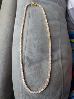 Gold tennis chain