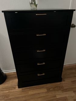Black dresser for nursery