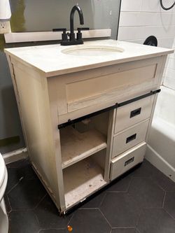 Sink vanity and fixtures