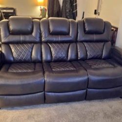 Beautiful like new Ashley Homestores leather faux recliner. MUST PICKUP ASAP in Clearwater. We're moving. 