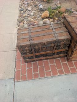 Two antique steamer trunks