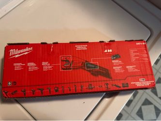 New Milwaukee M12 -12V Lithium-lon Cordless copper tubing cutter tool with charger and  one battery still in box .