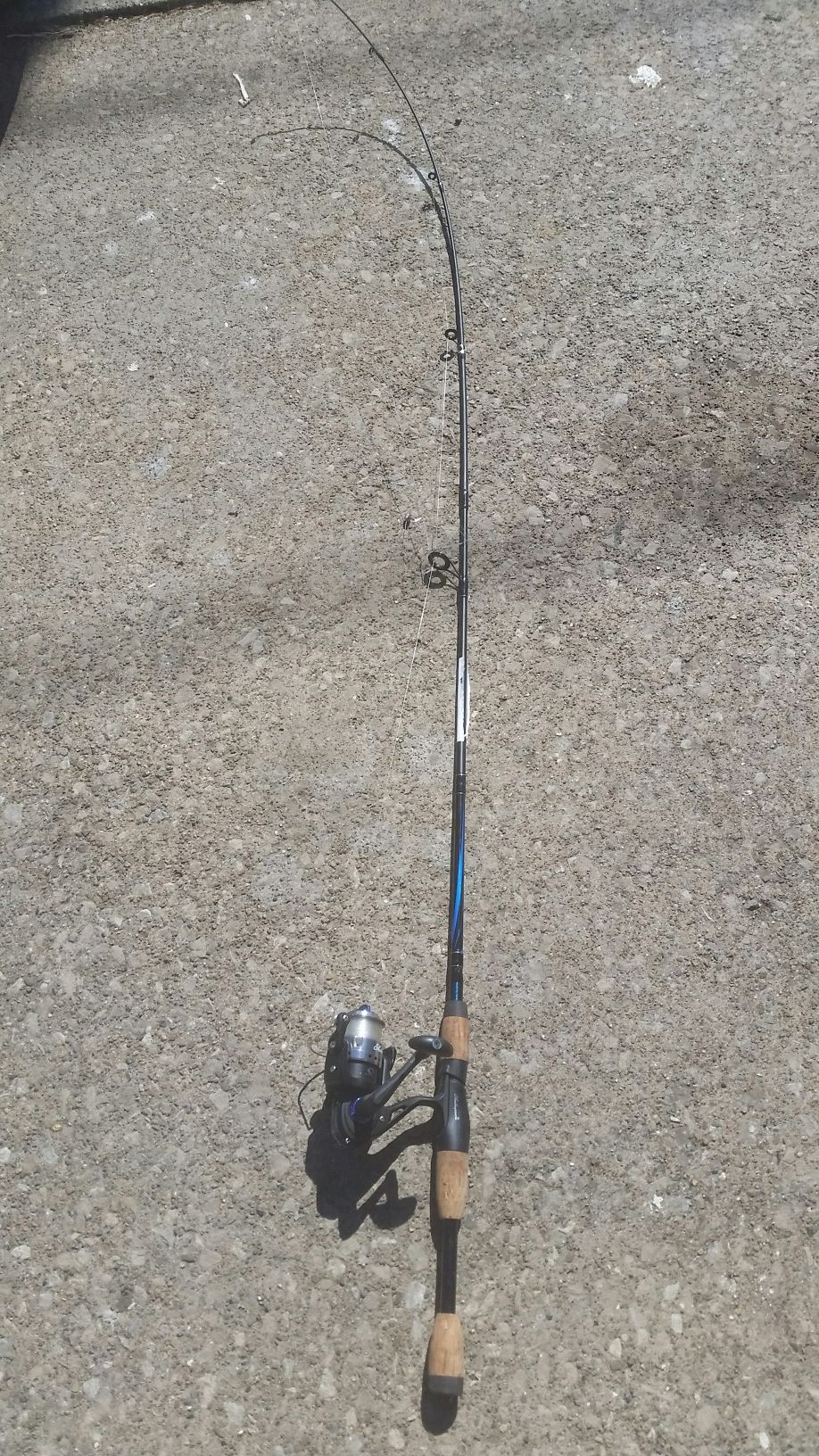 Shakespeare Conquest fishing rod and reel.
