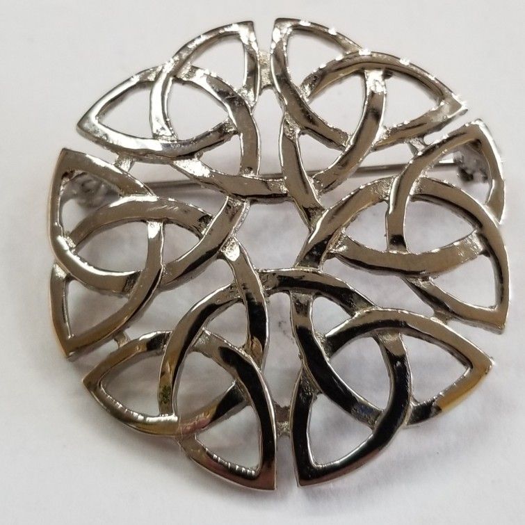 Silver Plated Pin.