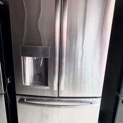 GE ENERGY STAR 25.7 Cu. Ft. French-Door Refrigerator with Water and ice Dispenser  Stainless Steel