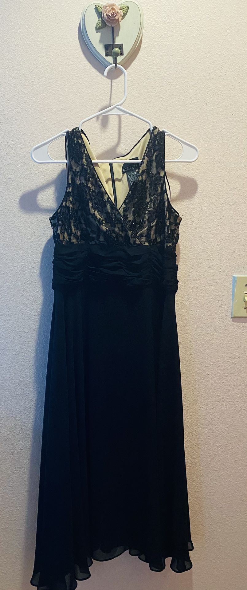 Black lace midi dress with bow detail, ideal for a special occasion #GothicGlamour #LaceDress #size 8