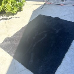 black fuzzy carpet
