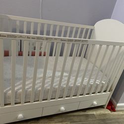 IKEA - White Crib With Drawers And Mattress + Delta Children Changing Table With Wheels 