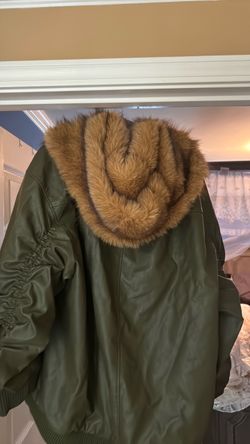 Faux leather jacket with full faux fur hood.