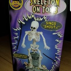 Halloween decoration Skeleton In A Tumb.