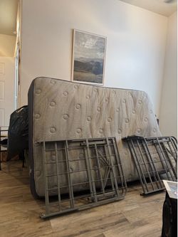 full-size mattress and bedframe
