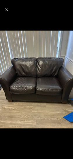 Brown faux leather couch